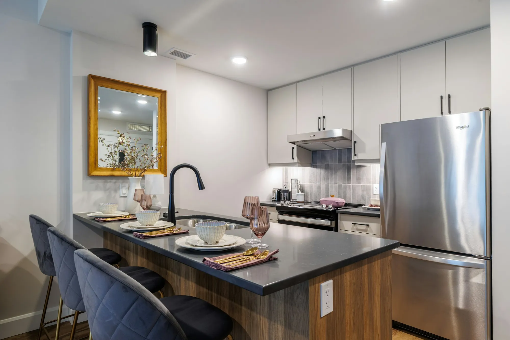 An open booklet on a modern kitchen counter