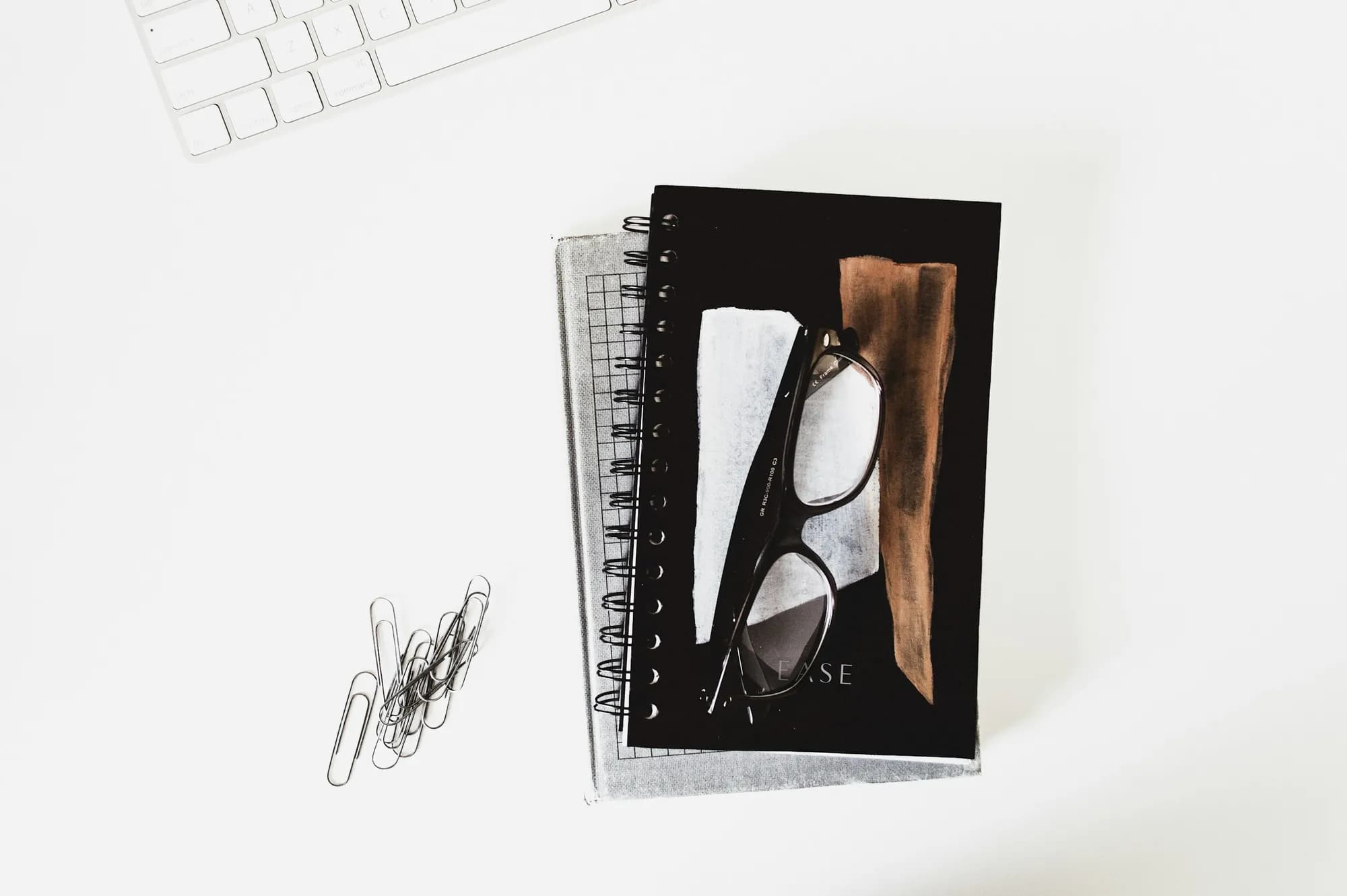 A printed booklet lying on a desk in a modern home