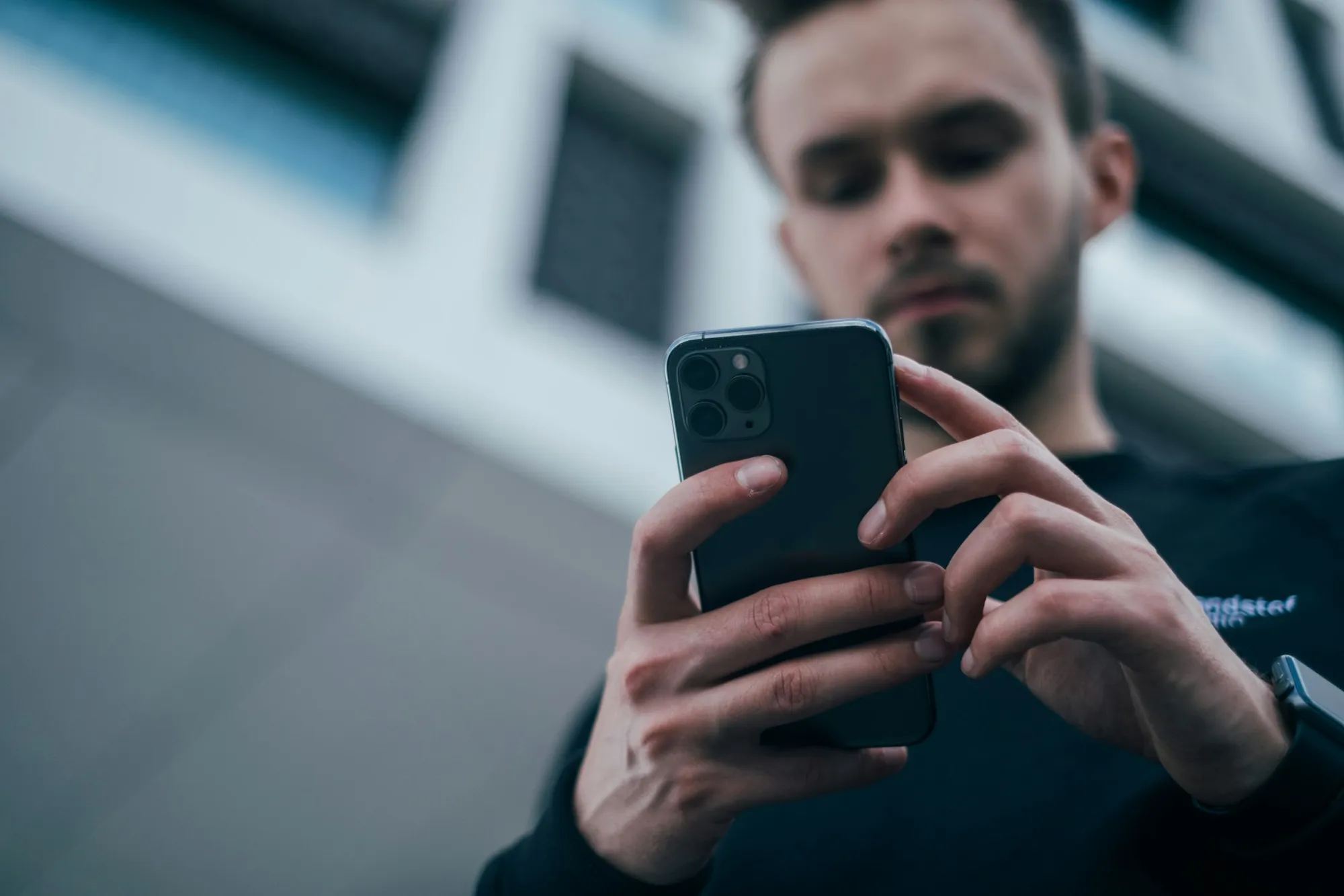 A smartphone near an apartment door in warm evening light