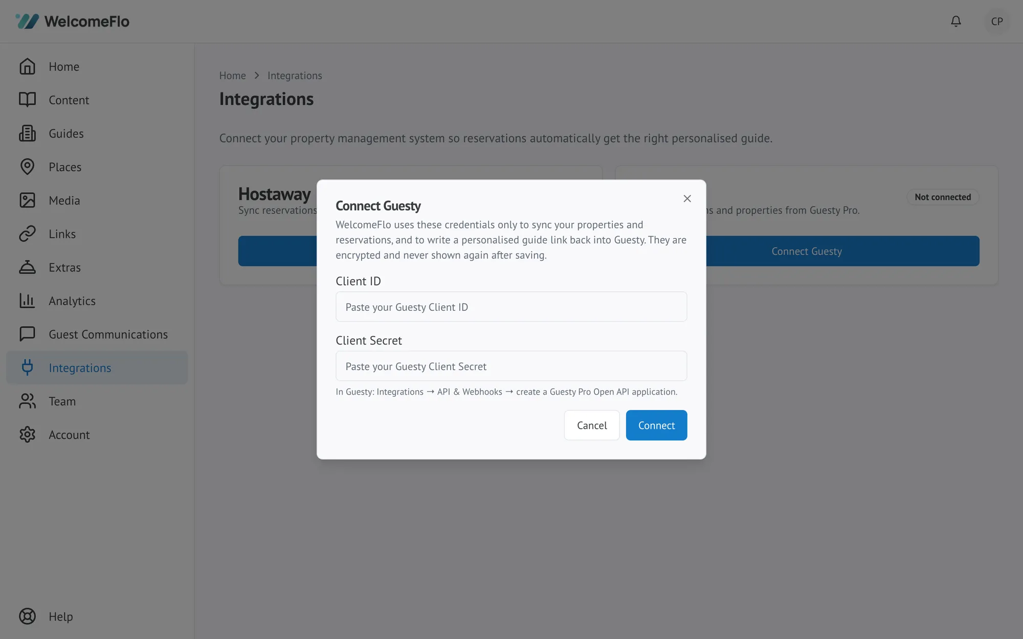 The Connect Guesty dialog, showing fields for the Client ID and Client Secret